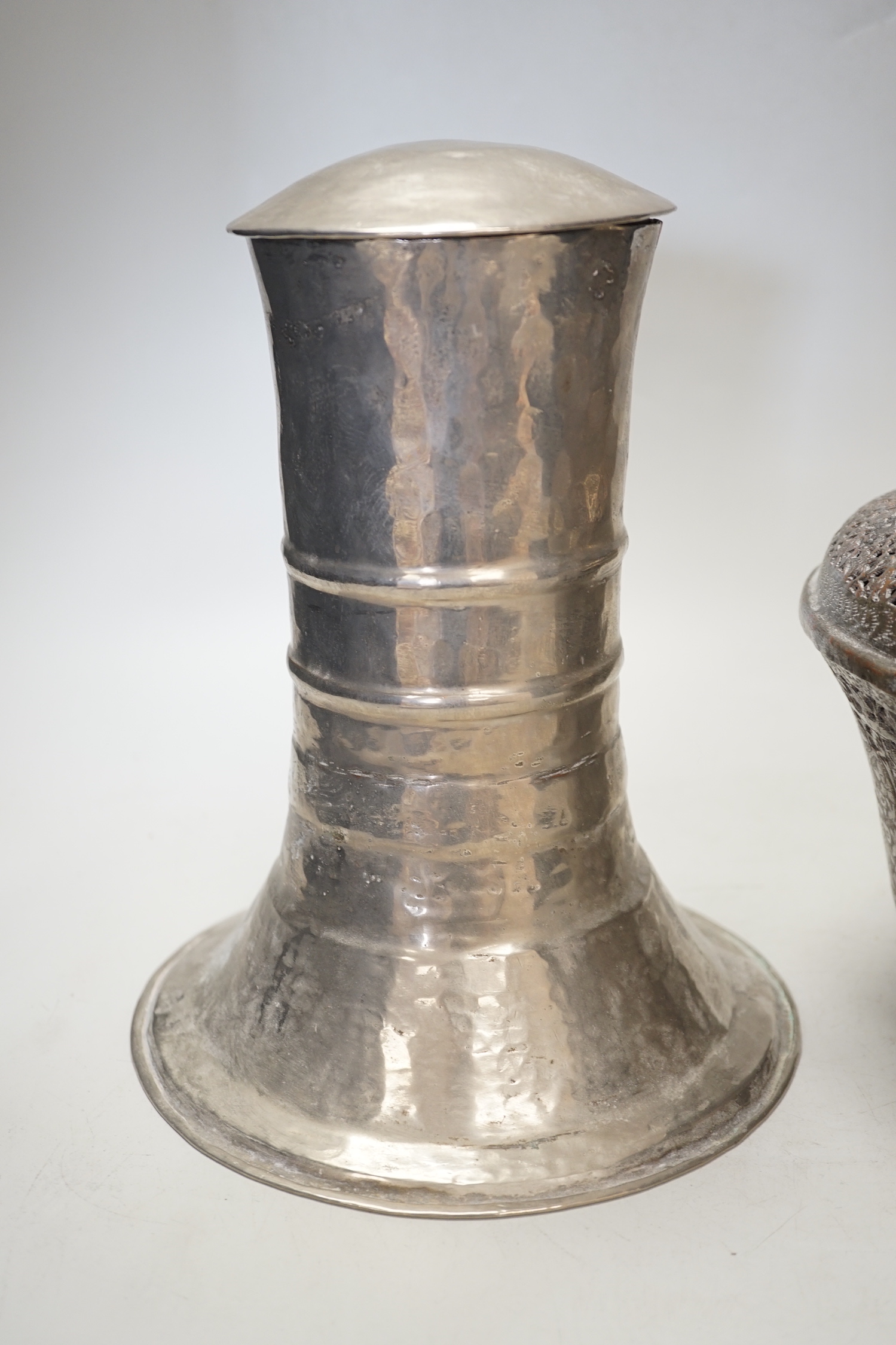 An Indian incense burner and a white metal lidded container, incense burner 29cm high